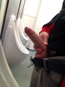 Hard uncut cock in toilet
