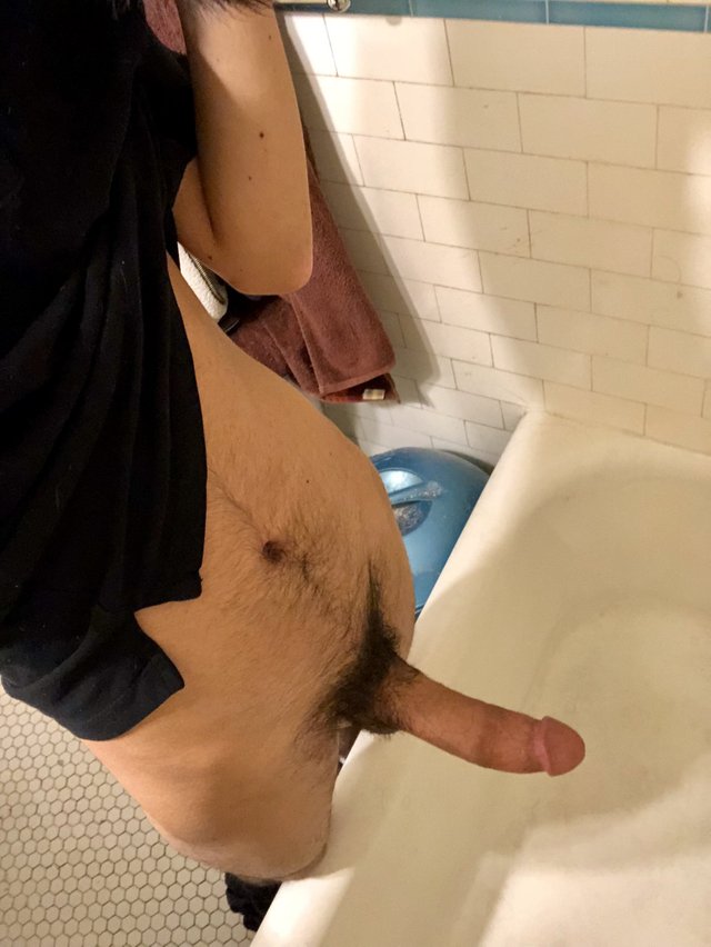 I like to masturbate my big cock in the bathtub